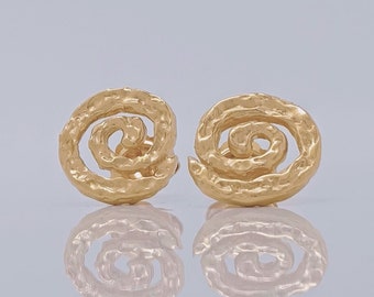 Contemporary earrings for women with a textured round spiral design in gold vermeil and a cool avant garde style.